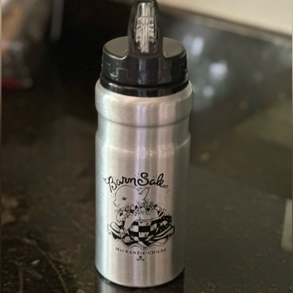 Mackenzie-Childs Barn Sale water bottle with flip up straw top.